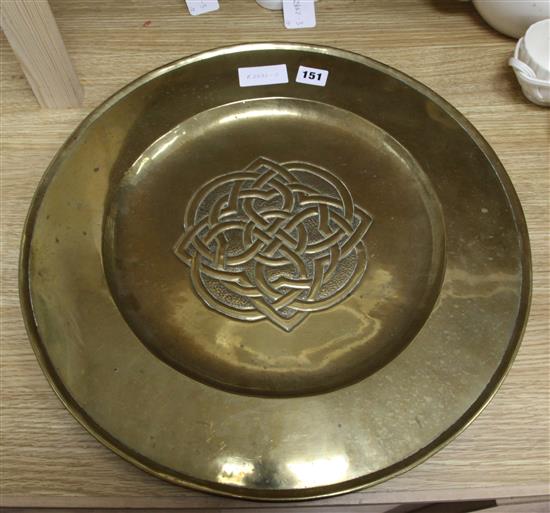 An Arts & Crafts brass charger, probably Scottish